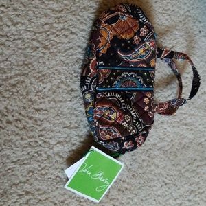 It is a vera bradley  with Los of different colors